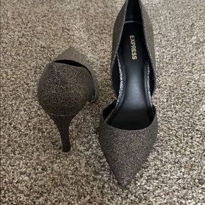 Express sparkly grey high heels.